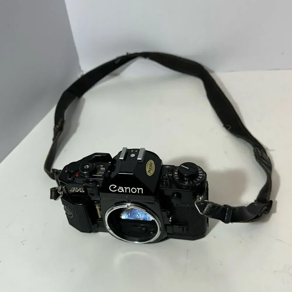Vintage Canon A-1 Black 35 mm SLR with Strap/ Body Only
